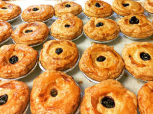 Mini blueberry pies fresh out of the oven is the kind of delicious food in assisted living to expect at Tamarisk Senior Living