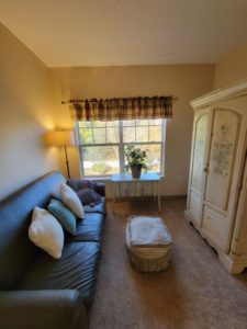 A cozy homelike Memory Support room at Tamarisk Senior Living