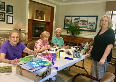 A group of residents enjoying an art class