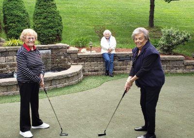 Residents playing golf