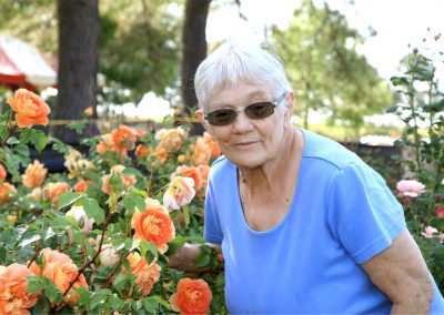 A woman in the rose garden