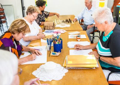 A group of residents enjoying arts and crafts class