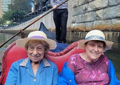 Two residents riding in a gondola