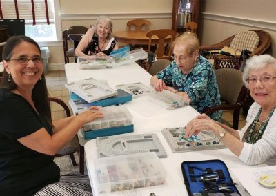 A group of residents enjoying an arts and crafts class