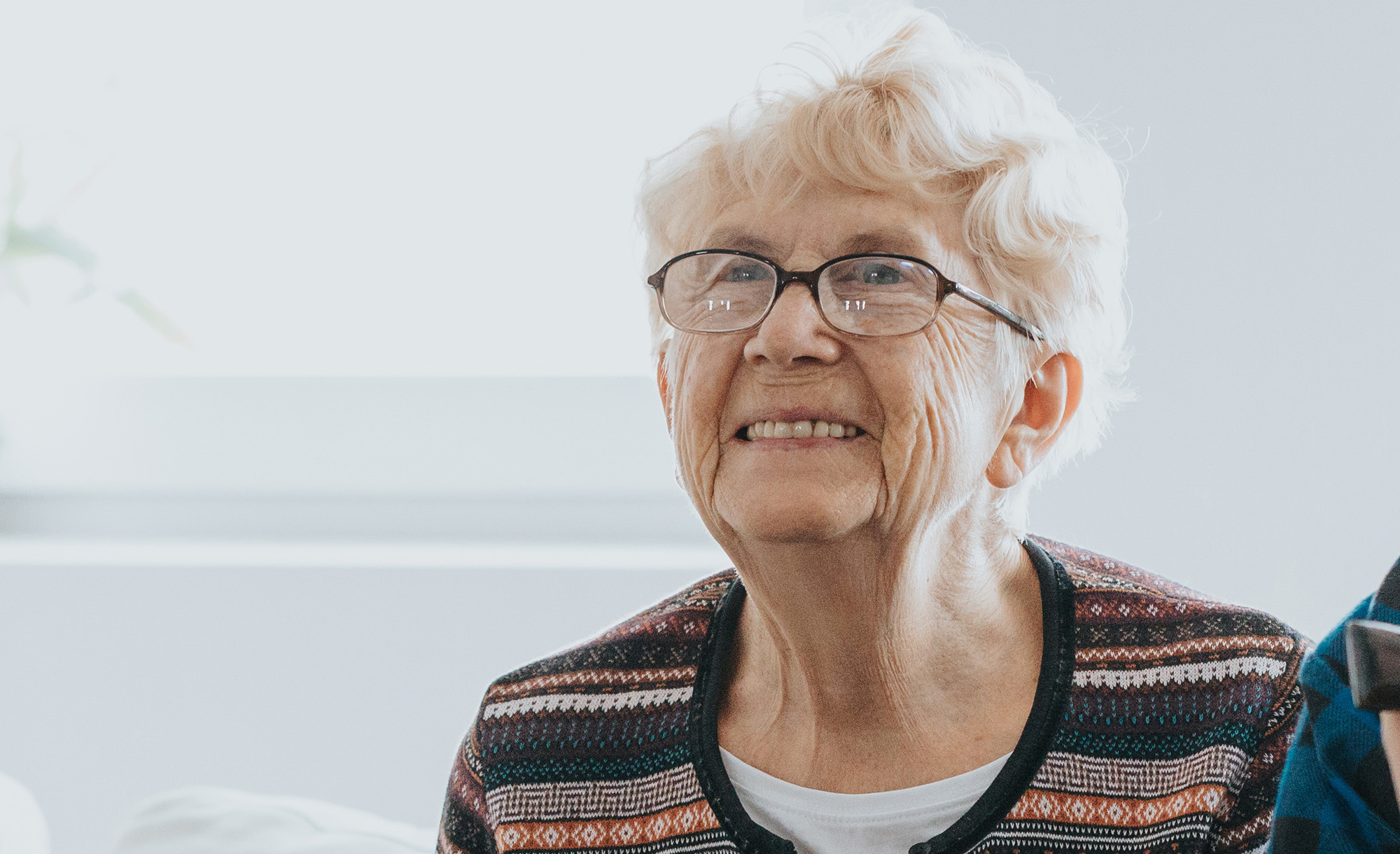 A woman smiling